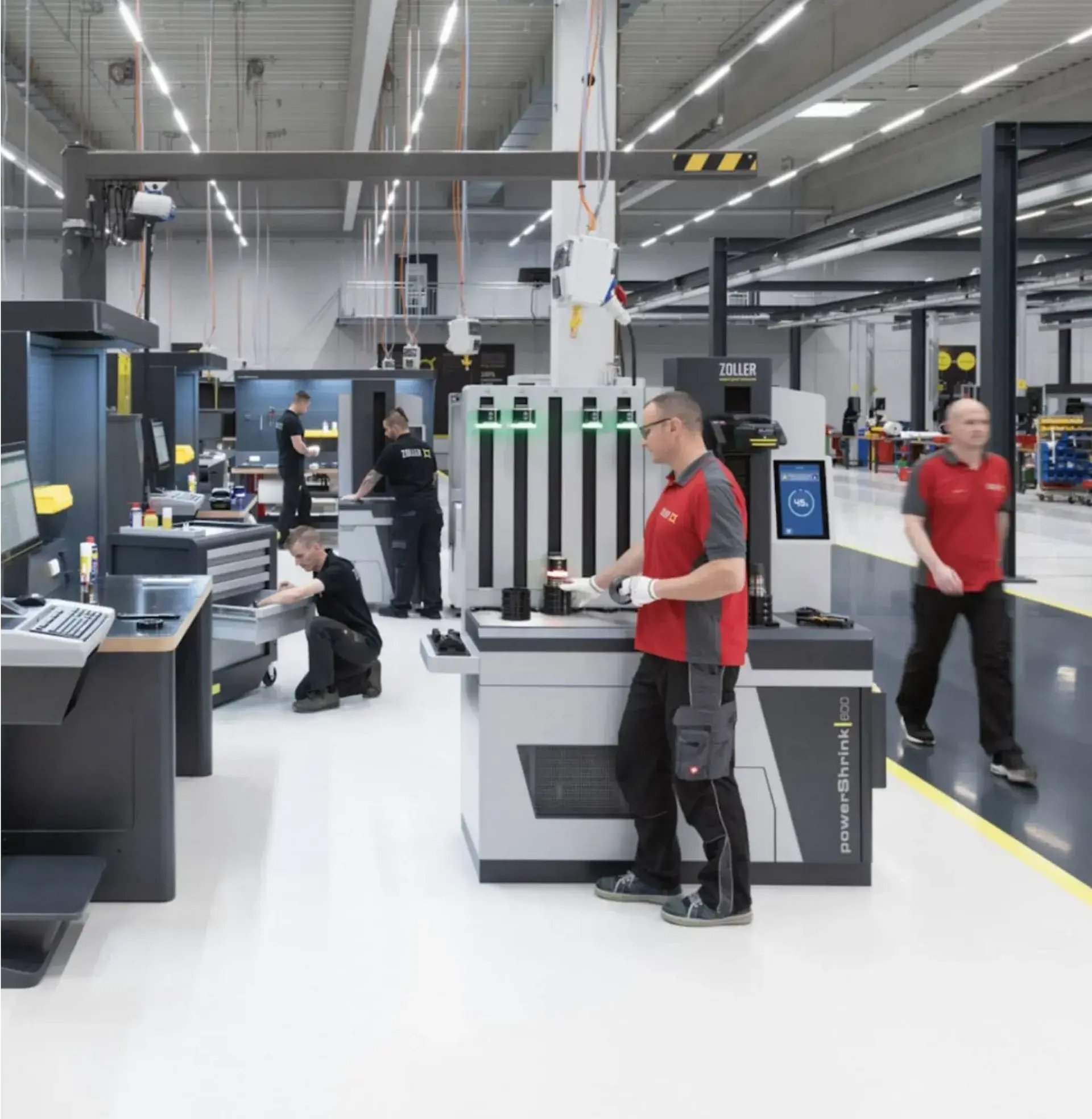 man standing in front of tool heat shrink machine